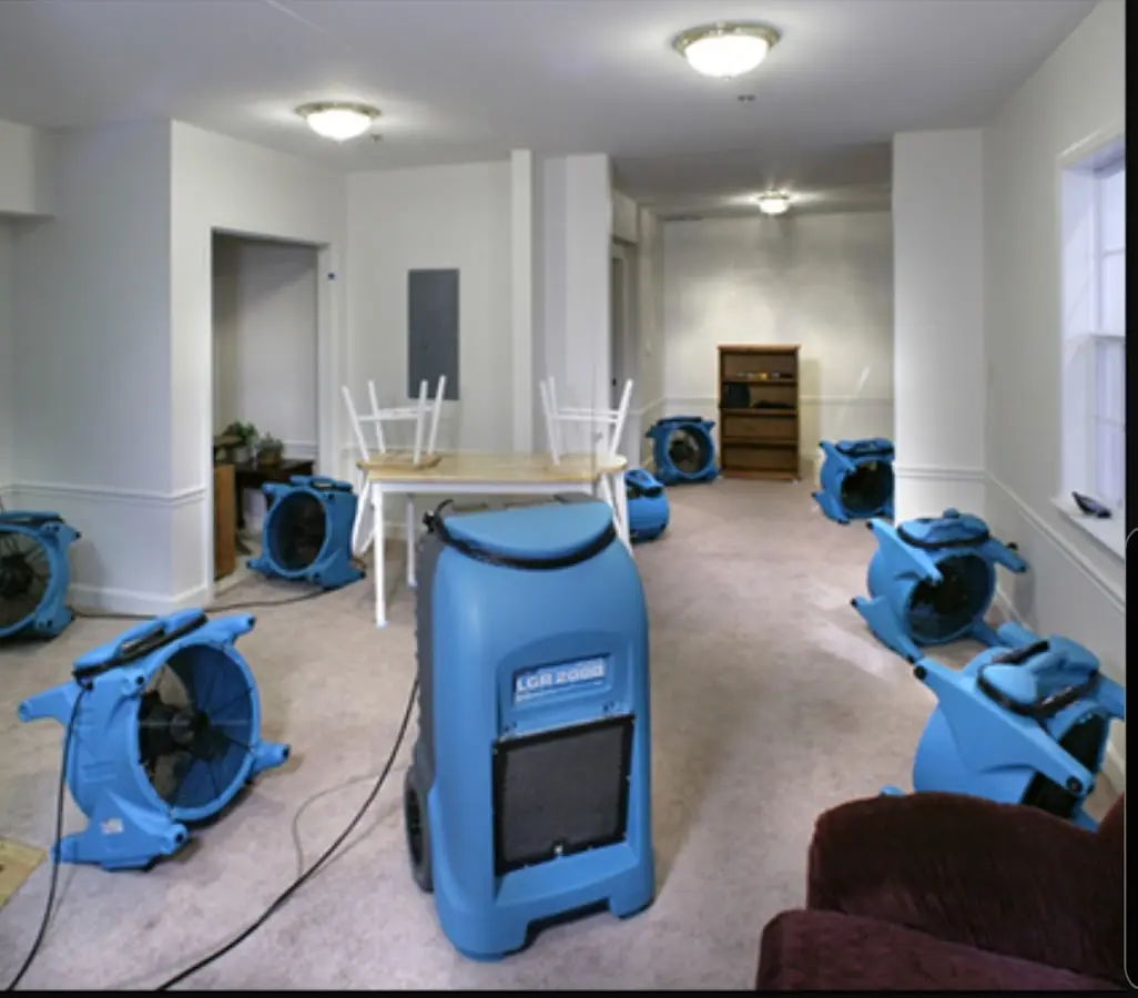 Air movers and dehumidifier setup for Water Damage Restoration in Delmar